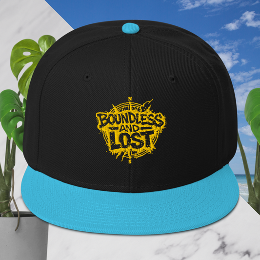 Boundless And Lost gold compass snapback hat black aqua front view